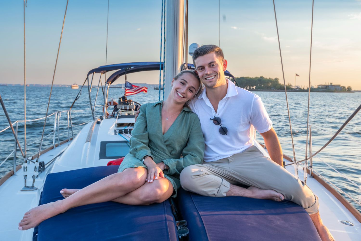 couple sitting on a sailboat for a romantic sailing nyc experience